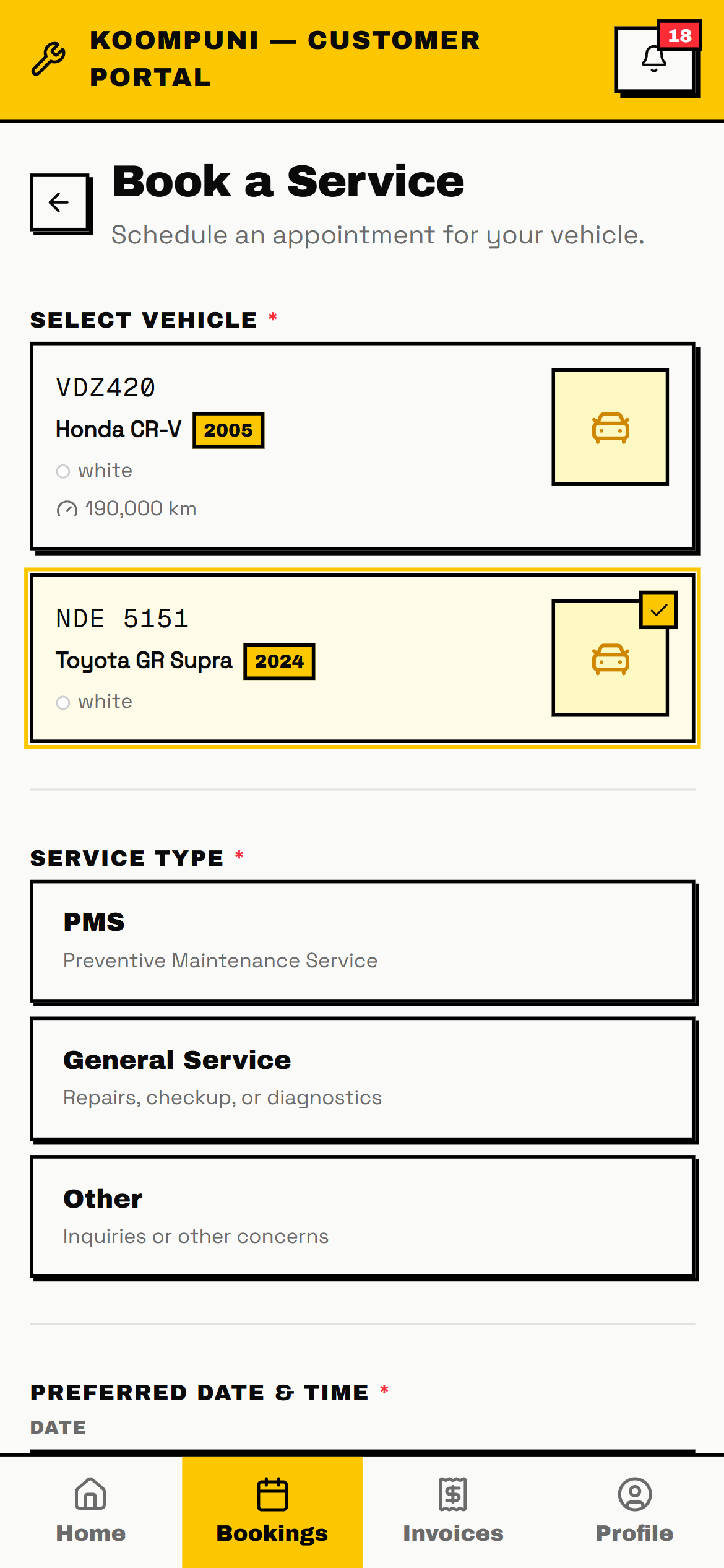 Customer portal book-a-service screen with vehicle and service-type selection